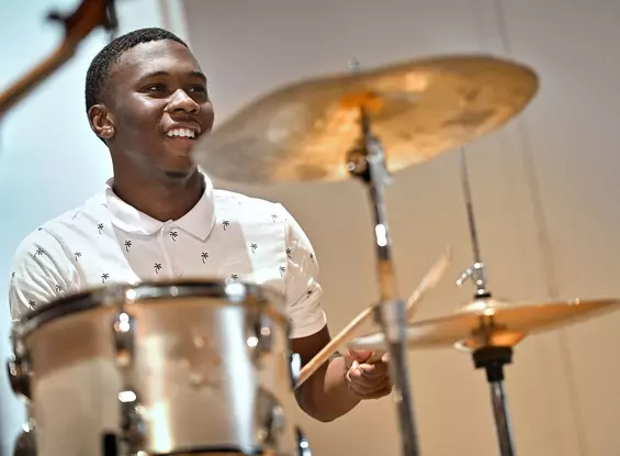 Image of student playing drums